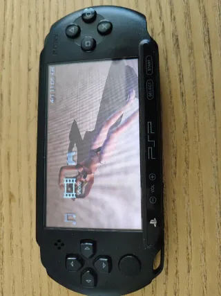 PSP Sony Nera + 4 Giochi