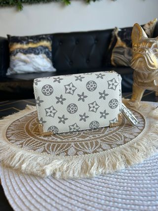 Cartera de mano con estampado
