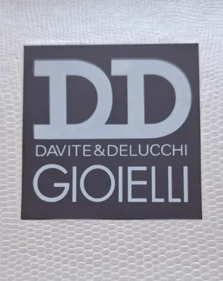 Collana DD Gioielli cuore con fiocco rosa oro.