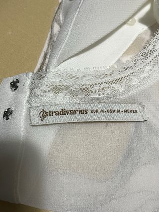 Blusa gasa bordada cuello alto sin mangas