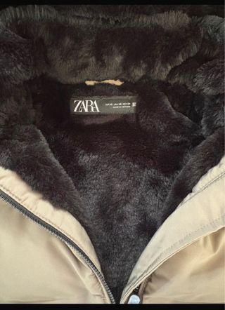 Abrigo plumífero Zara gris con capucha