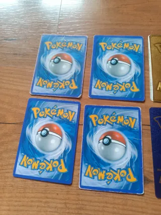 Cartas Pokémon Doradas y Moradas V/VMAX