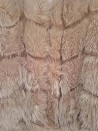 Chaleco pelo sintético rosa