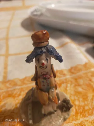 Figuras de porcelana de payasos músicos