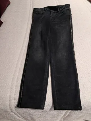 Pantalón vaquero azul con cremallera lateral