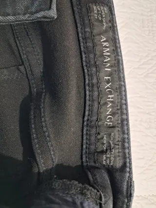 Pantalón vaquero azul con cremallera lateral