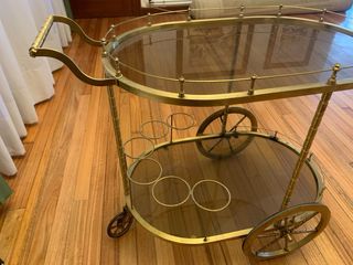 Carrito bar dorado con ruedas y cristal
