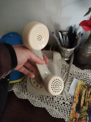 Teléfono antiguo retro beige/gris