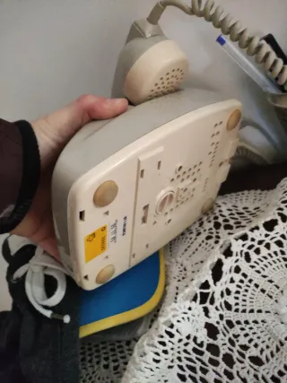 Teléfono antiguo retro beige/gris