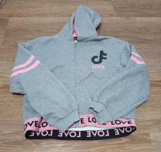 Sudadera gris y rosa con logo TikTok