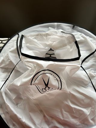 Capa para cortar pelo