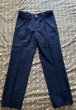 Traje de niño azul con pajarita roja