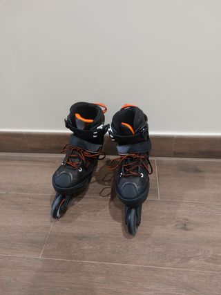 Patines en línea + protecciones + bolsa