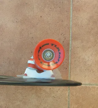 Patinete Oxelo y Skate Tuana