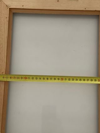 Marco de madera y metal dorado