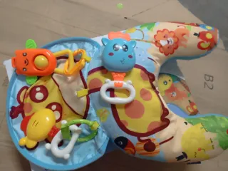 Cojín de actividades Juguettos para bebé