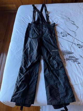 Mono de esquí Spyder amarillo y negro