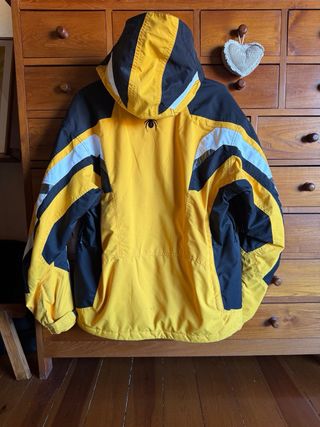 Mono de esquí Spyder amarillo y negro