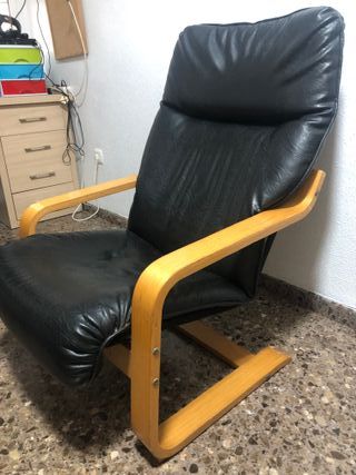 Sillón balancín cuero y madera