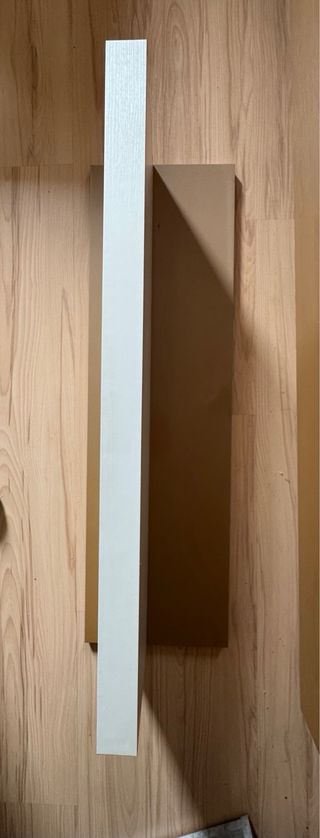 Mueble de salón modular blanco y dorado