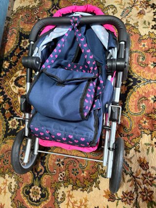 Carro de muñecas con unicornio