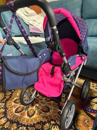 Carro de muñecas con unicornio