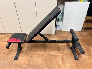 Banco de pesas Domyos con barra,mancuernas y pesas