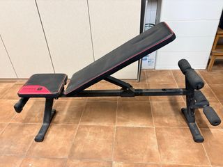 Banco de pesas Domyos con barra,mancuernas y pesas