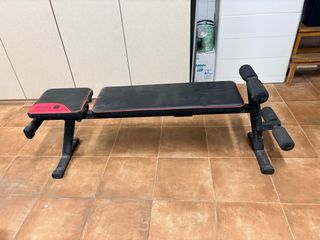 Banco de pesas Domyos con barra,mancuernas y pesas