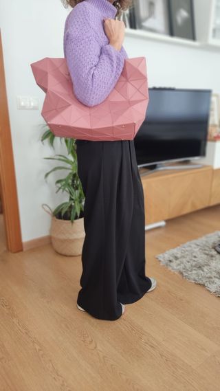 Bolso piel rosa modelo Origami. Buen estado