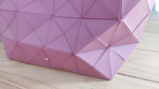 Bolso piel rosa modelo Origami. Buen estado