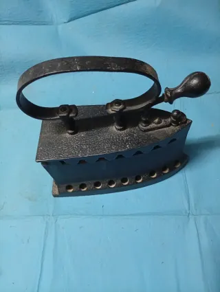 Plancha antigua de carbón