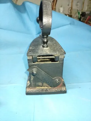 Plancha antigua de carbón