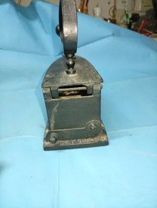 Plancha antigua de carbón