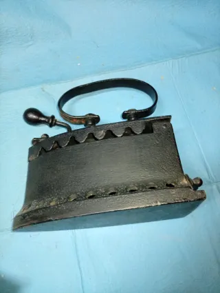 Plancha antigua de carbón