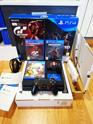 Ps4 SLIM 1Tb + CAJA + MANDO + 4 JUEGOS + CARGADOR