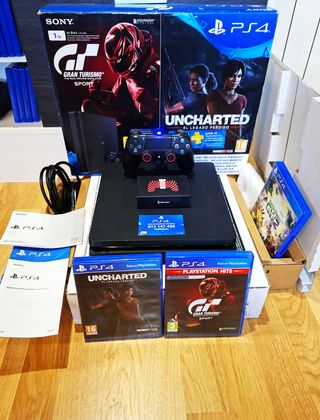 Ps4 SLIM 1Tb + CAJA + MANDO + 4 JUEGOS + CARGADOR