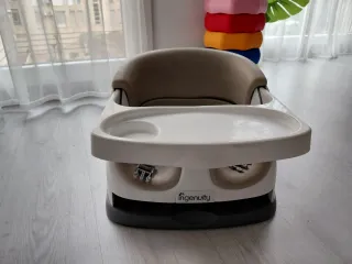 Asiento y elevador de viaje Ingenuity