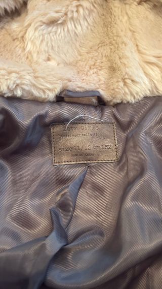 Cazadora de piel beige con capucha