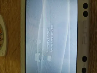 Sony PSP 1004 con caricatore e giochi