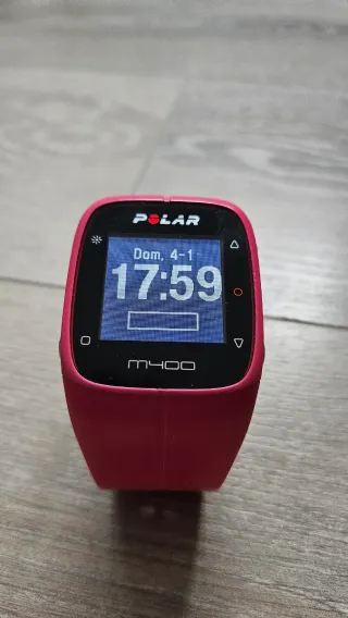 Polar M400 rosa con cinta deportiva