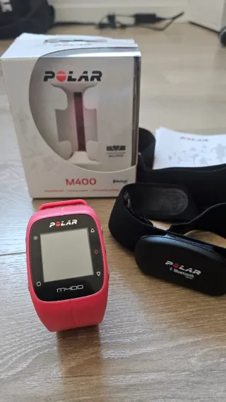 Polar M400 rosa con cinta deportiva