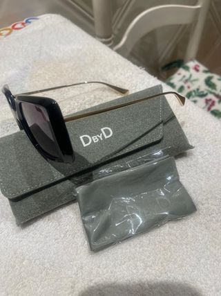 Gafas de sol mujer DBYD negras y doradas