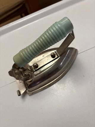 Plancha antigua de metal