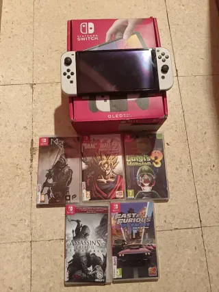 Nintendo Switch OLED + 5 Giochi