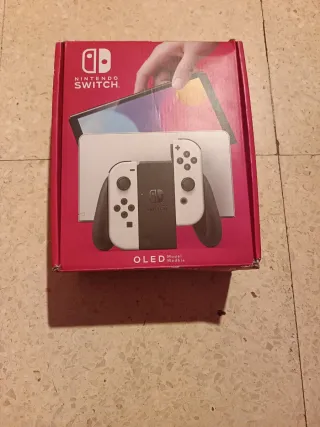 Nintendo Switch OLED + 5 Giochi