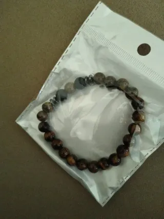 Pulseras de cuentas marrones y grises