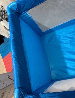 Cuna de viaje azul