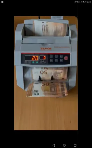 Contador y detector de billetes falsos