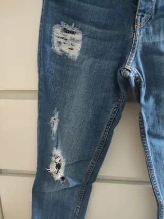 Pantalón vaquero high waist rotos